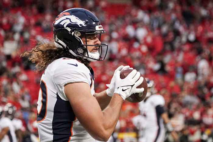 Denver Broncos tight end Greg Dulcich (80) warms up against the Kansas City Chiefs prior to a game at GEHA Field at Arrowhead Stadium.